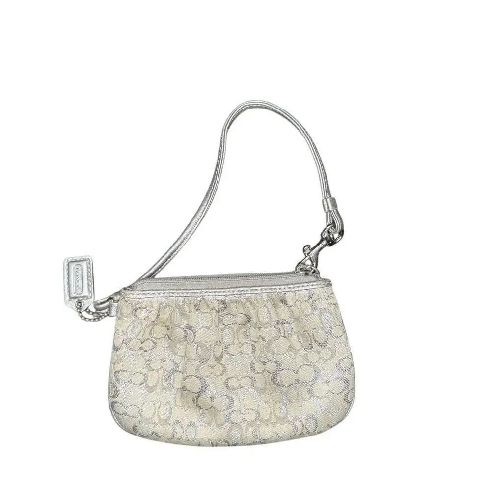 Coach mini clutch in silver
